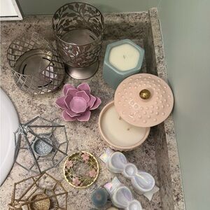 Bundle of candles and candle holders